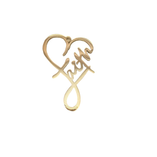 Gold necklace pendant with 'Eternal' engraving on a wooden surface