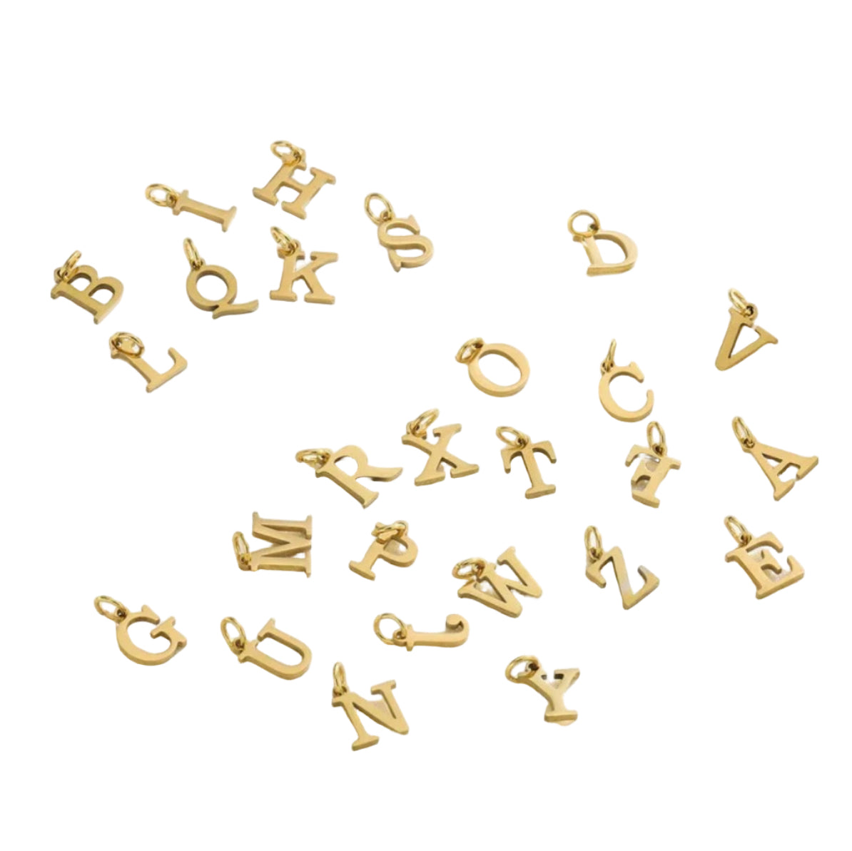 Gold letter pendants on a white surface