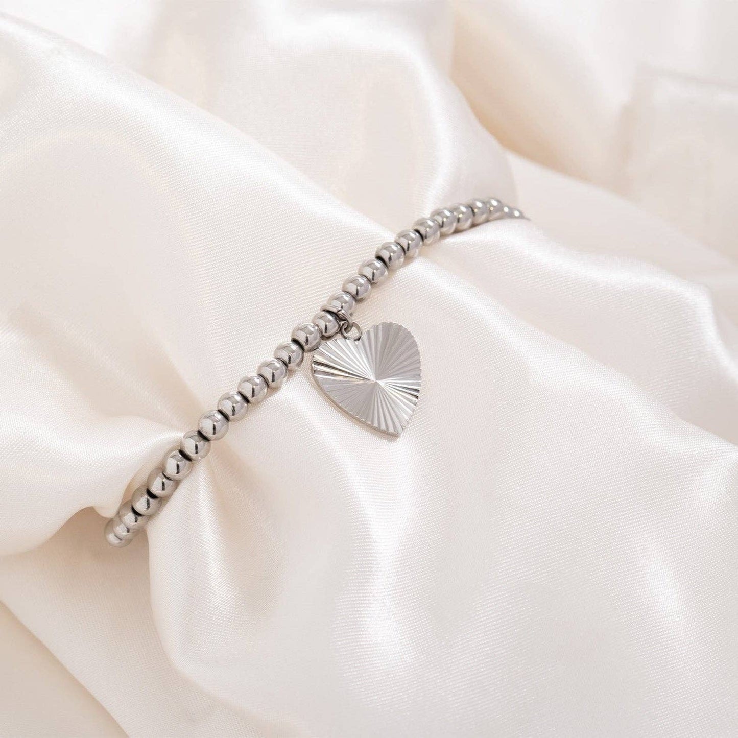 Sunburst Heart Charm 18k gold finish