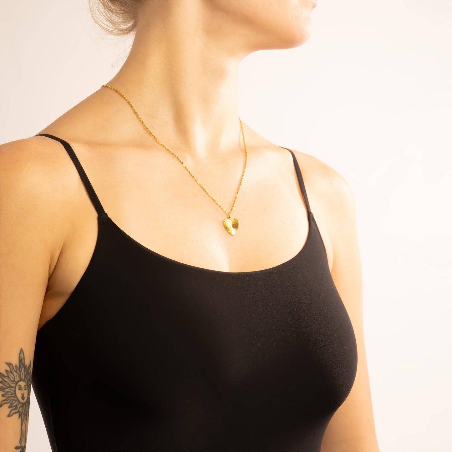 Sunburst Heart Charm 18k gold finish