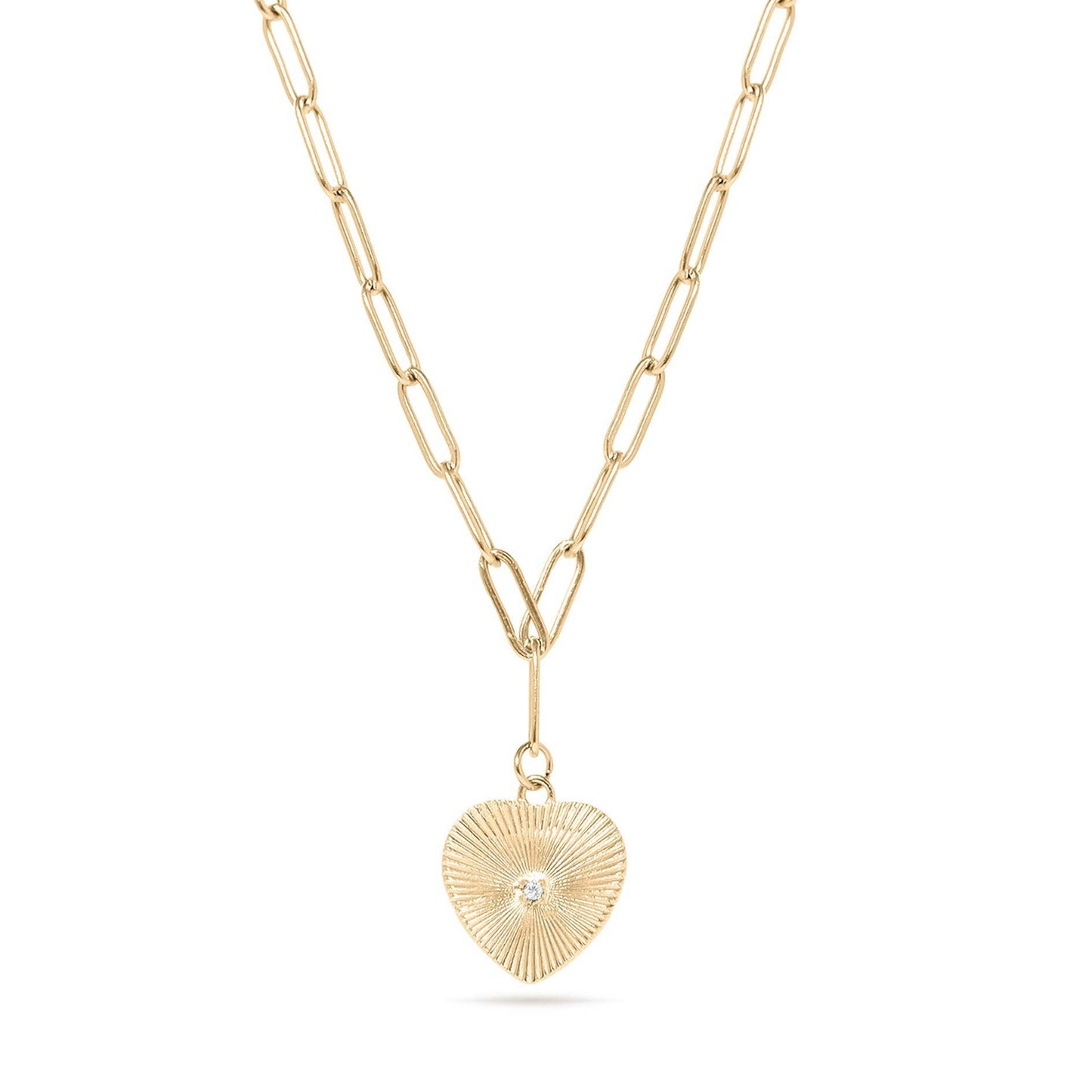 Gold necklace with a heart-shaped pendant on a white background