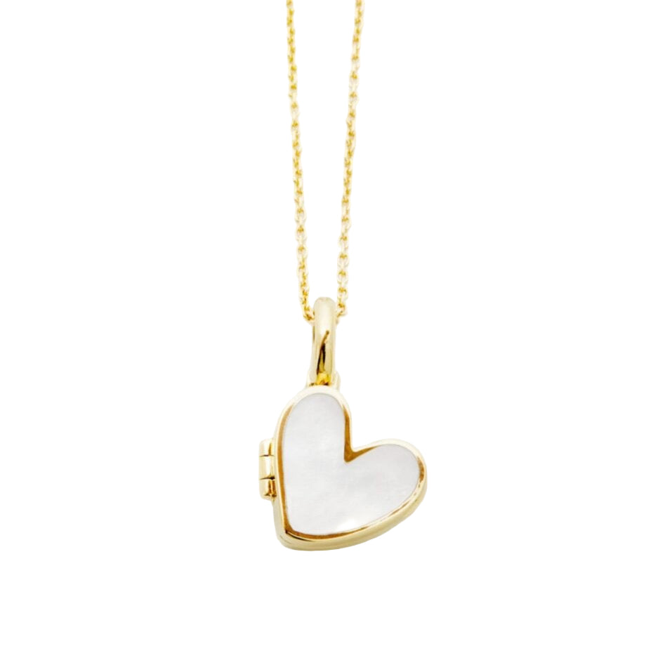 Heart-shaped pendant on a gold chain against a white background