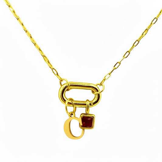Gold necklace with a lock-shaped pendant on a white background