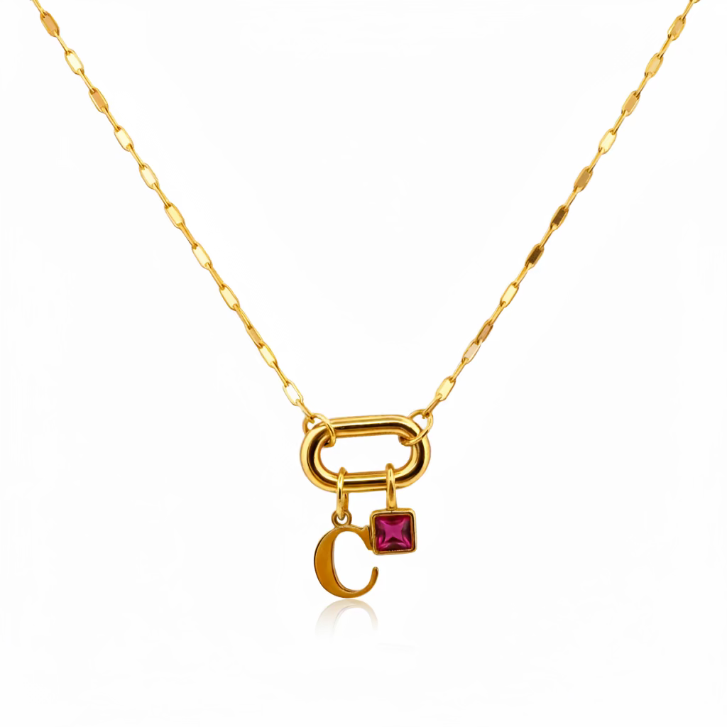 Gold necklace with a unique clasp on a white background