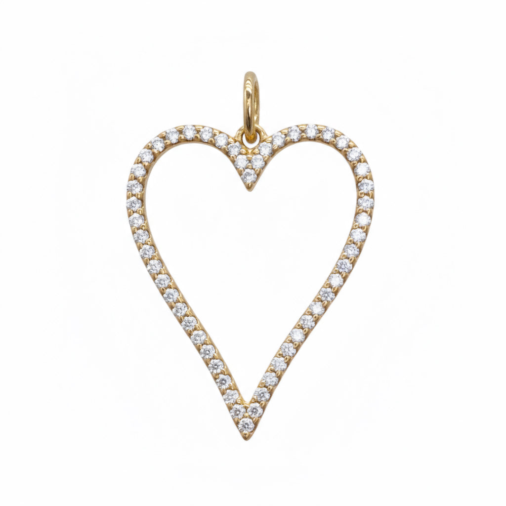 Heart-shaped pendant with clear stones on a white background