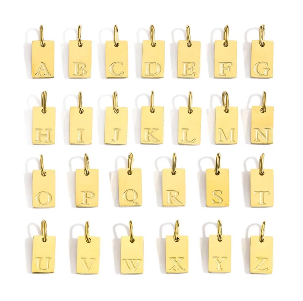 Gold letter tags from A to Z on a white background