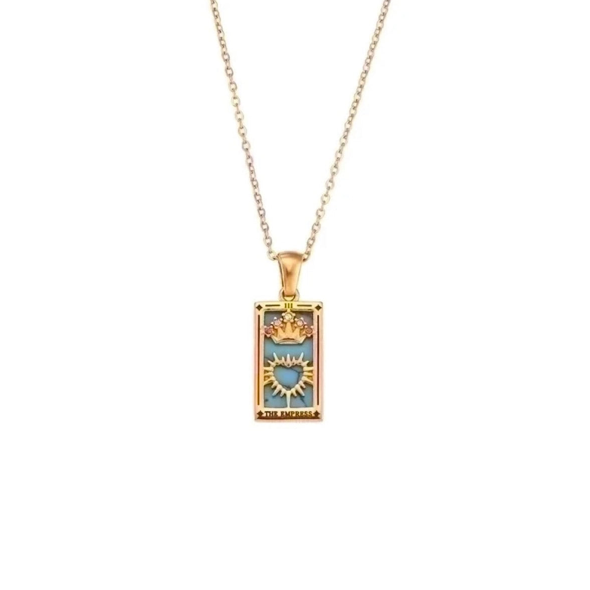 Gold necklace with a rectangular pendant featuring a sun design on a white background