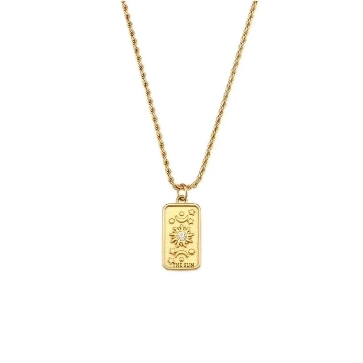 Gold necklace with a rectangular pendant on a white background